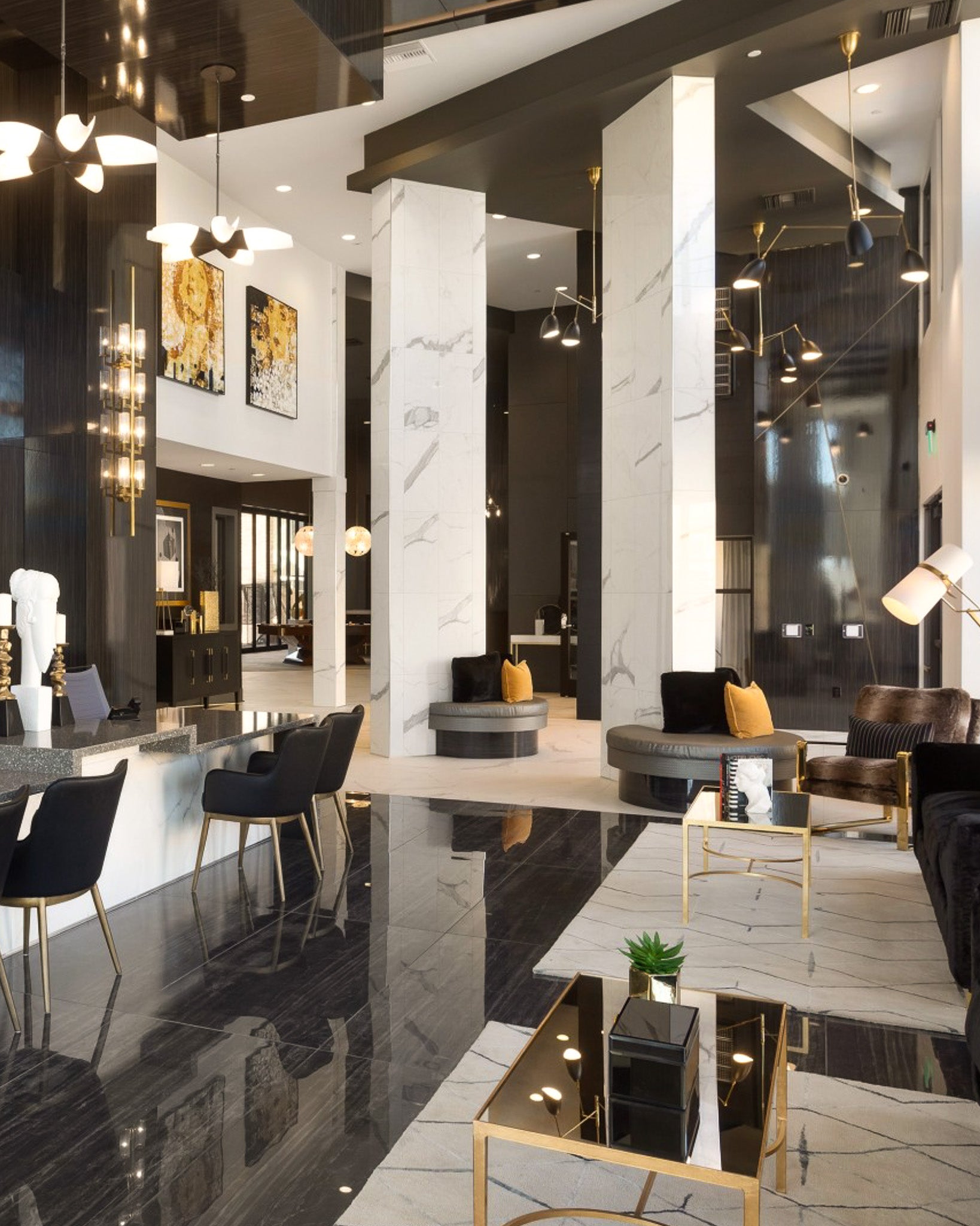 Two vintage-inspired abstract figurative artworks on canvas by WRAPPED Studio, featured in a luxury lobby for Wood Partners.