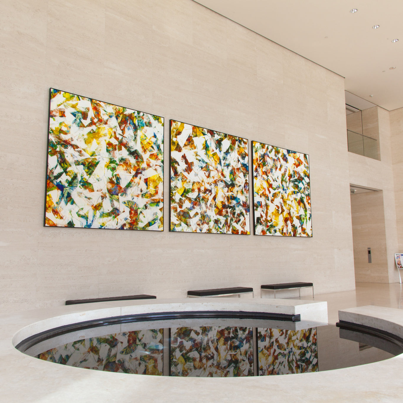 Custom large-format canvas art created by WRAPPED Studio for MacArthur Court office lobby, inspired by Newport's natural beauty, accentuating the lobby's modern elegance.
