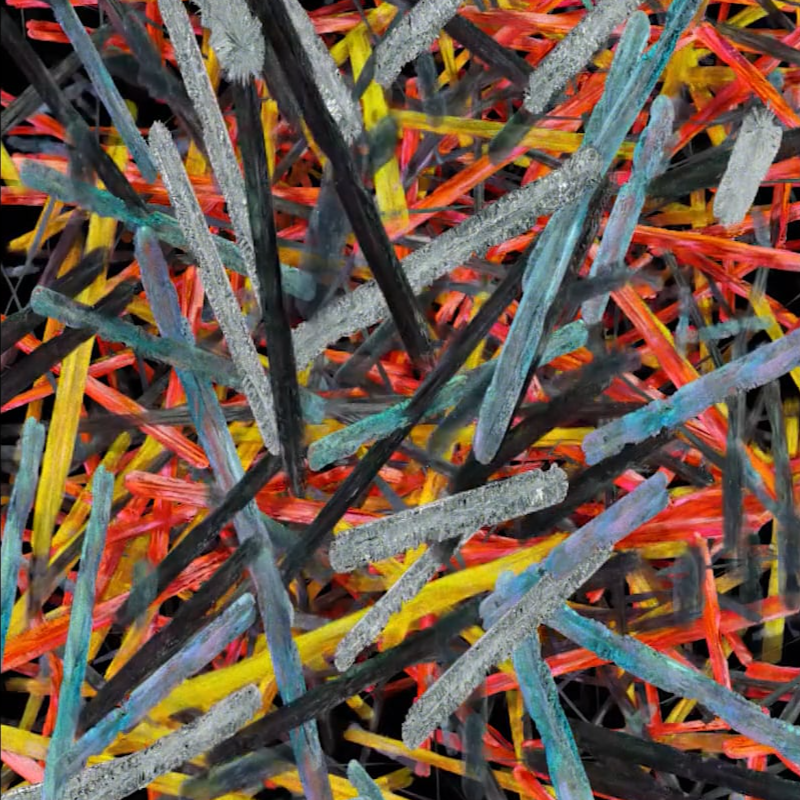 Intricately arranged sticks in a video art thumbnail, with vibrant splashes of color adding depth and texture to the intertwined composition.