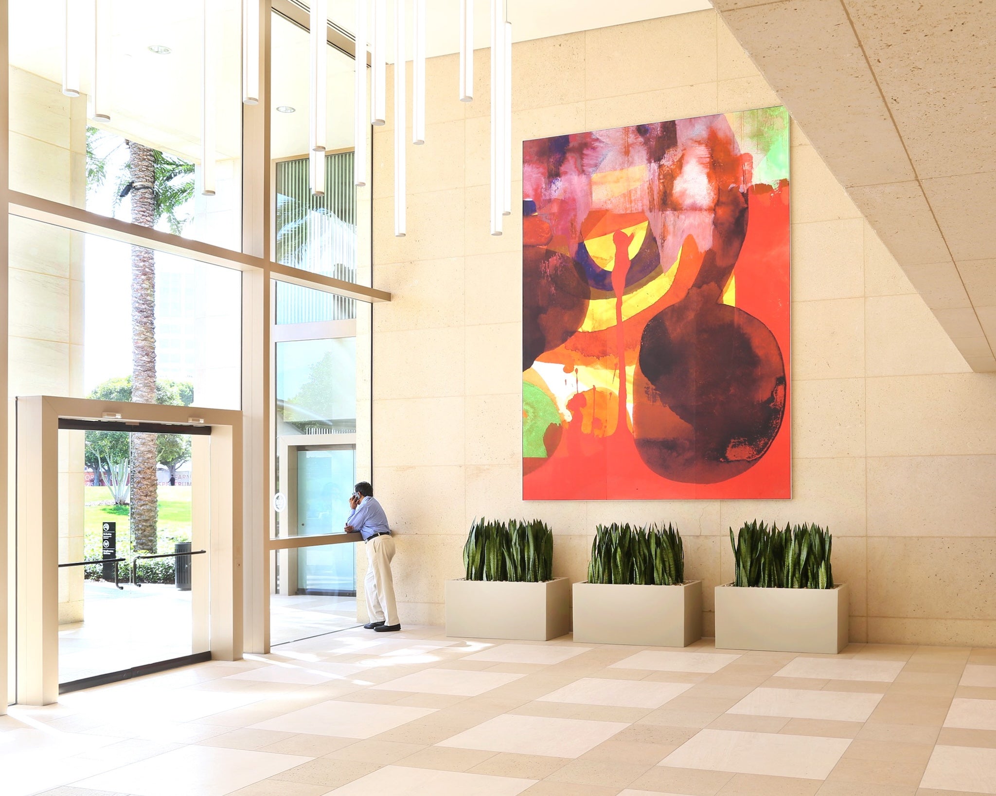 Large-scale custom abstract artwork by WRAPPED Studio, installed in the main lobby of 300 Spectrum corporate tower.