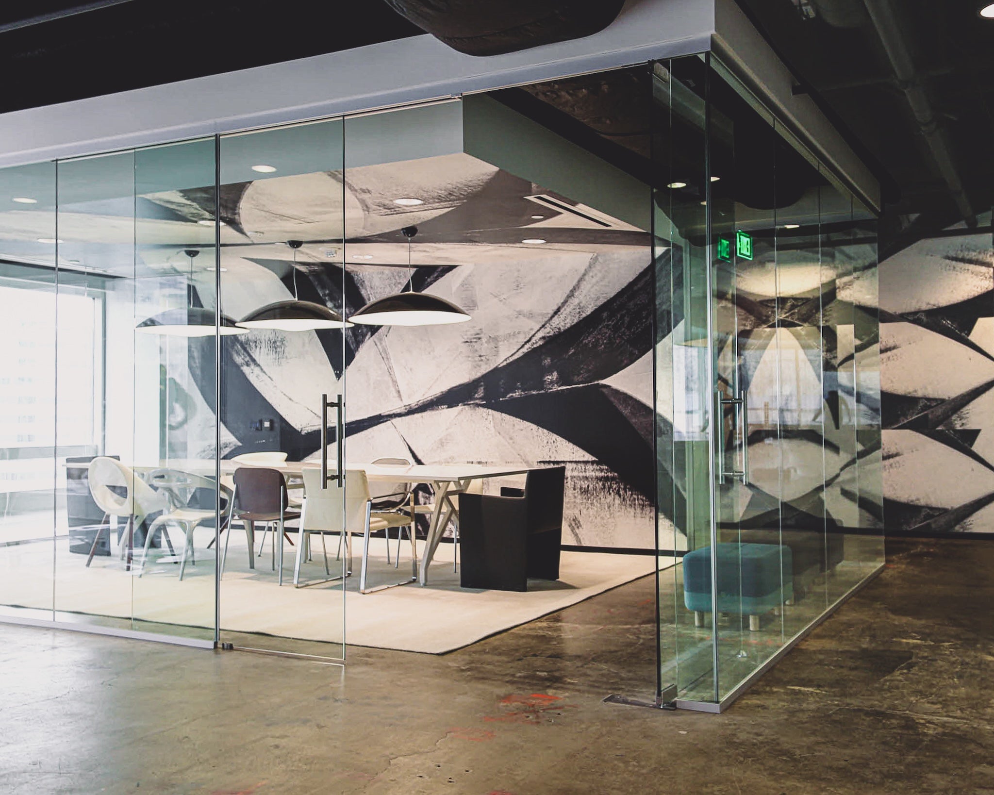 Custom digital wallcovering by WRAPPED Studio for a glass-walled conference room at Brookfield Design Hive.
