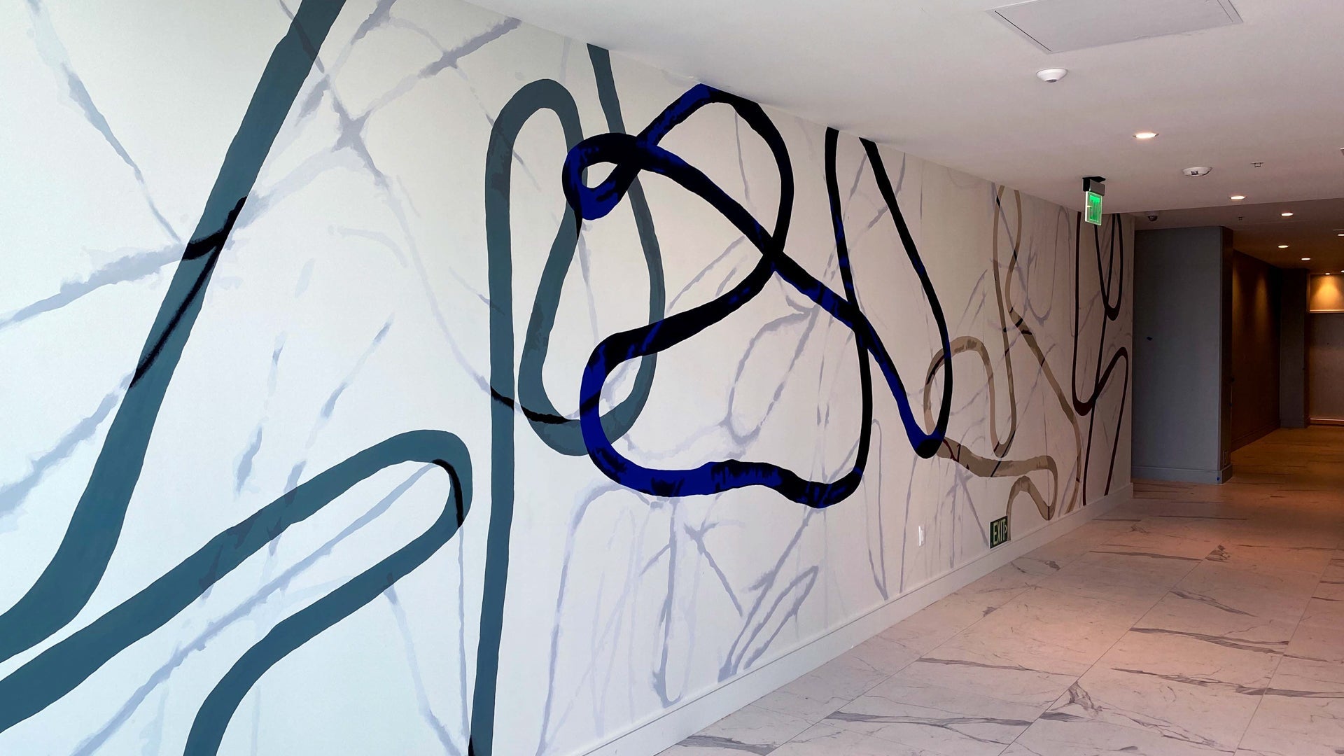 A minimalist wallcovering for the lobby of a multifamily apartment complex. 